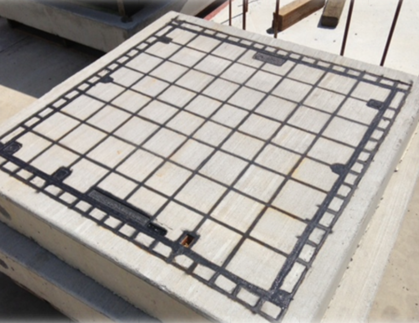 CONCRETE ENCASED CAST IRON INFILL COVERS